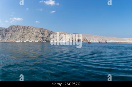 Panorama of Khasab, Musandam, Oman port for Dhow Boat trips on a beautiful blue sky sunny day in the Persian (or Arabian) Gulf near Strait of Hormuz. Stock Photo