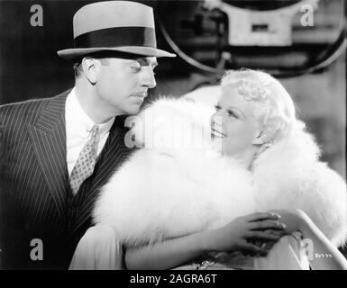 WILLIAM POWELL and JEAN HARLOW on set candid portrait during filming of RECKLESS 1935 director VICTOR FLEMING producer DAVID O. SELZNICK Metro Goldwyn Mayer Stock Photo