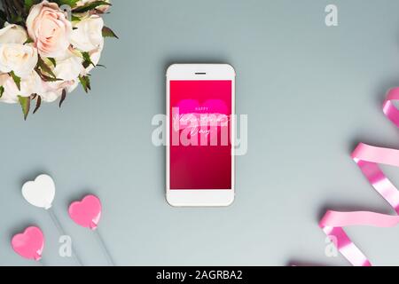 Mockup mobile smart phone for Valentine's day banner background concept.  Mock up template for Valentines Day. Love moment with technology concept.  Top Stock Photo - Alamy