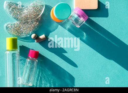 Travel size cosmetic and creams containers set.  Stock Photo