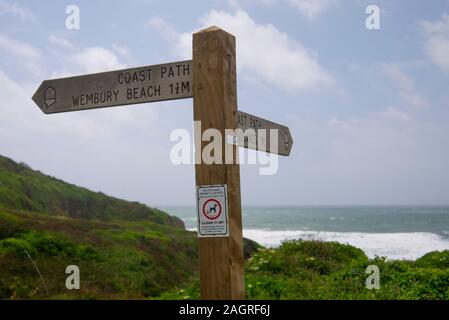 Signpost on the South West Coastal Path near Plymouth Cornwall England UK Stock Photo