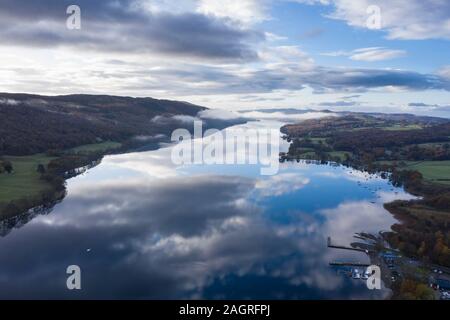 Stunning aerial drone landscape images over Coniston Water at sunrise on beautiful Autumn Fall morning Stock Photo