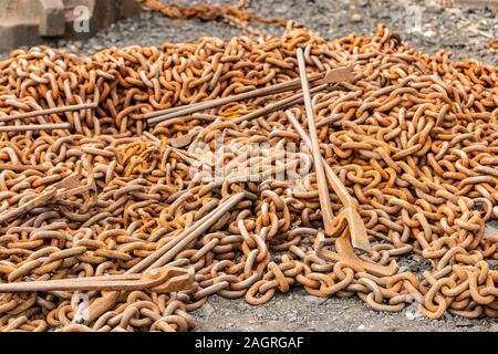 pile of rusty old cast iron chains in a forge at the Black Country Living Museum, Tipton, Birmingham West Midlands Stock Photo