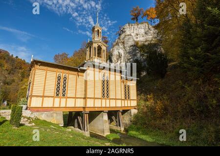 Chapel On the Water, or Chapel of St. Joseph the Worker is a Catholic wooden chapel located in the Ojcowski National Park, Lesser Poland Voivodeship, Stock Photo