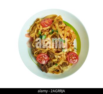 Tomato Beef Country Casserole, Tomato, mushrooms, creamy sauce, beef, and tender egg noodles. Stock Photo