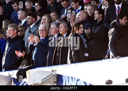 Everton manager Carlo Ancelotti with chairman Bill Kenwright and owner Farhad Moshiri in the stands as Arsenal manager Mikel Arteta (far right) looks on during the Premier League match at Goodison Park, Liverpool. Stock Photo