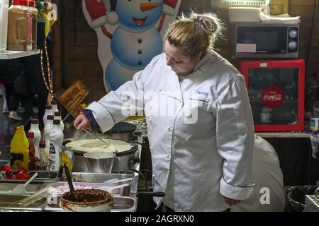 Glasgow, UK. 21 December 2019. On the last shopping Saturday before Christmas, thousands of customers flock to Glasgow City centre to enjoy the street entertainment provided by Govan branch of the Salvation Army, the international foods at the Street markets and the many executive shops in Buchanan Street, known as Glasgow's 'Style Mile'.  Credit: Findlay / Alamy News Stock Photo