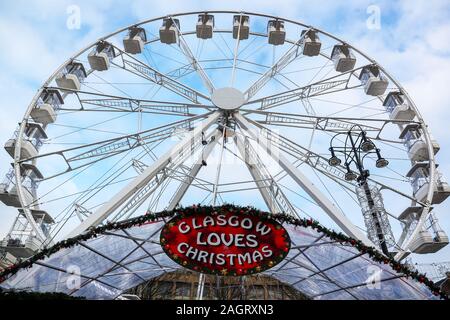 Glasgow, UK. 21 December 2019. On the last shopping Saturday before Christmas, thousands of customers flock to Glasgow City centre to enjoy the street entertainment provided by Govan branch of the Salvation Army, the international foods at the Street markets and the many executive shops in Buchanan Street, known as Glasgow's 'Style Mile'.  Credit: Findlay / Alamy News Stock Photo