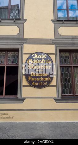 Bamberg 2019. Plate of the historic Schlenkerla brewery. Inaugurated in this place in 1405, it is currently one of the most beloved German independent Stock Photo