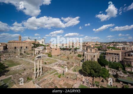 Rome. Italy. View of the Roman Forum (Forum Romanum/Foro Romano) from the Palatine Hill.   Foreground are the remains of the Temple of Castor and Poll Stock Photo