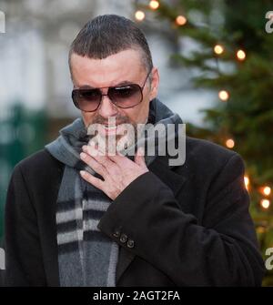 george michael cigarette George Michael arrives back in 2011 at his home in Highgate after spending  a month in Hospital in Austria with influenza Stock Photo