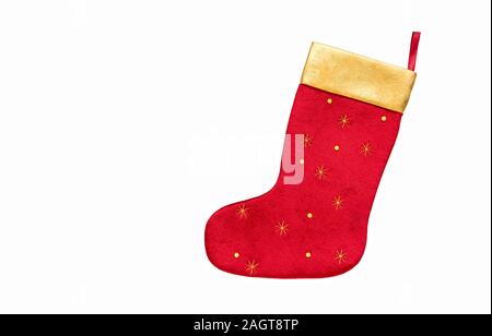 Christmas sock isolated on white background. Red christmas boot close up. Stock Photo