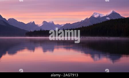 Long exposure panoramic image of the Maligne Lake close to Jasper with early morning mood, Alberta, Canada Stock Photo