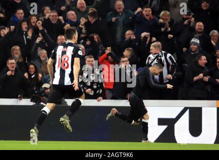 Newcastle United's Miguel Almiron (right) celebrates scoring his side's first goal of the game during the Premier League match at St James' Park, Newcastle. Stock Photo