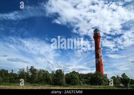 The Picture from the wild coast of Paldiski in Estonia. You can see the old lighthouse standing on the shore, used for navigation in past times. Stock Photo