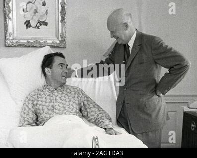 US President Dwight Eisenhower chatting with ailing Vice-president Richard Nixon, Washington, DC, USA 1960 Stock Photo