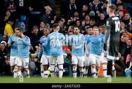 Manchester City's Ilkay Gundogan (centre) celebrates scoring his side's ...