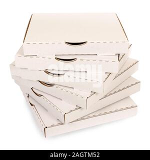 Small stack of blank pizza boxes isolated on a white background. Stock Photo