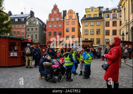 Sweden, Stockholm, December 18, 2019: Christmas atmosphere of the city. School children and city guests in the Christmas market in Stockholm Old Town. Stock Photo