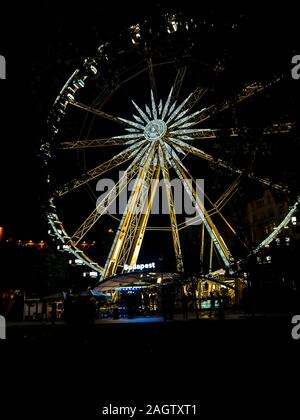 cabins of the budapest eye turning ferris wheel Stock Photo - Alamy