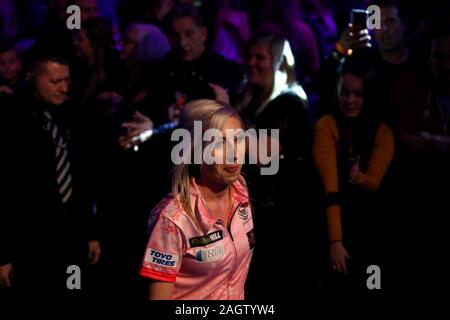 Fallon Sherrock during the walk on during day nine of the William Hill World Championships at Alexandra Palace, London. Stock Photo