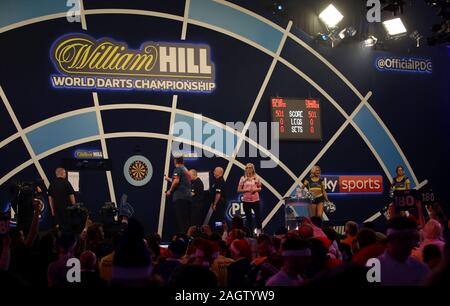 Fallon Sherrock during the walk on during day nine of the William Hill World Championships at Alexandra Palace, London. Stock Photo