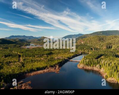 Beautiful Aerial Panoramic View of Kennedy Lake during a vibrant sunny day. Located on the West Coast of Vancouver Island near Tofino and Ucluelet, Br Stock Photo