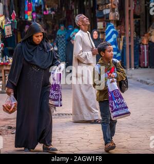 November 2019, LUXOR, EGYPT - Moslem People of Egypt go shopping at Luxor Souq Stock Photo