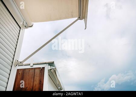 Blinds and white awnings in an exhibition booth. Stock Photo