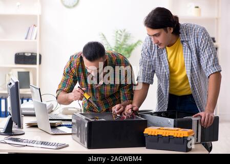 The it engineers working on hardware issue Stock Photo