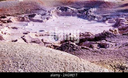 Bubbling Mud in Fountain Paint Pot Geyser at the Fountain Paint Pot Trail in Yellowstone National Park, Wyoming, United States Stock Photo