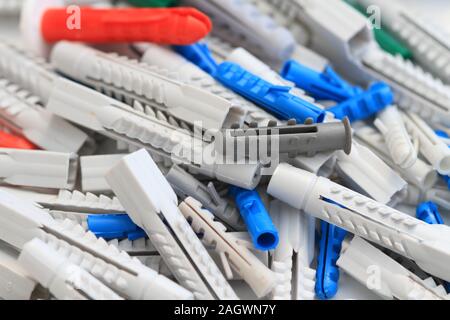 many colorful different plastic dowels Stock Photo