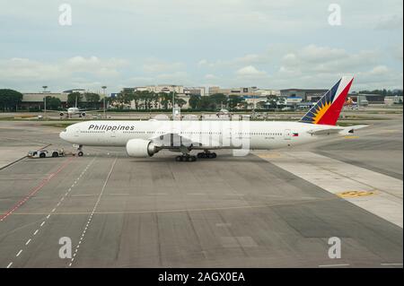 19.12.2019, Singapore, Republic of Singapore, Asia - A Philippine Airlines Boeing 777-300 ER passenger plane at Changi Airport. Stock Photo