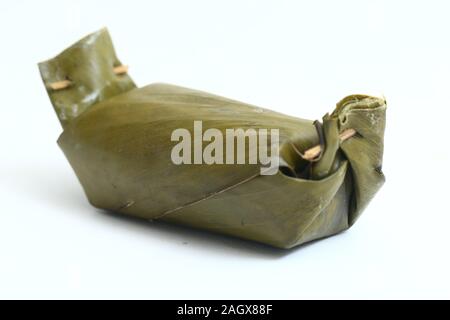 arem-arem or lemper is traditional food from java. isolated on white background Stock Photo