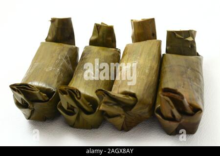 arem-arem or lemper is traditional food from java. isolated on white background Stock Photo