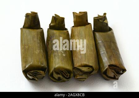 arem-arem or lemper is traditional food from java. isolated on white background Stock Photo