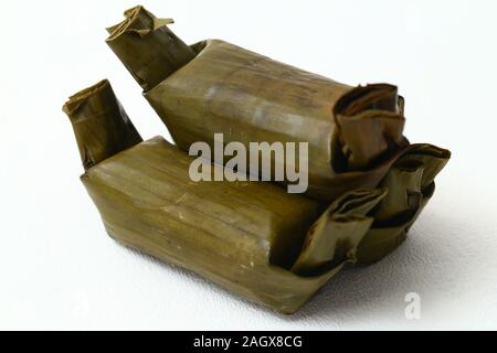 arem-arem or lemper is traditional food from java. isolated on white background Stock Photo