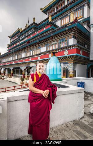 GHOOM, INDIA - MARCH 18, 2017: Smiling buddhist monk in Dali Monastery Ghoom, India. Stock Photo