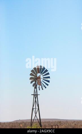 Windmill to power a water pump in the Karoo region of South Africa's Eastern Cape Province. Stock Photo