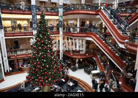 Shoppers in Princes Square Shopping Centre, Glasgow, on the last Sunday before Christmas.
