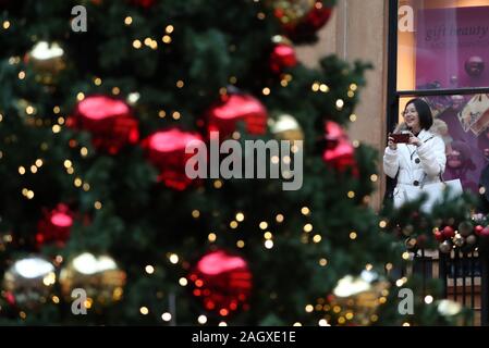 Shoppers in Princes Square Shopping Centre, Glasgow, on the last Sunday before Christmas. PA Photo. Picture date: Sunday December 22, 2019. Photo credit should read: Andrew Milligan/PA Wire Stock Photo
