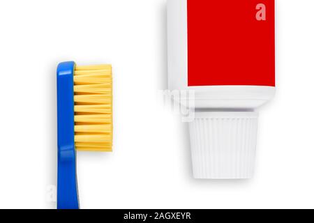 Toothbrush and toothpaste isolated on white background. Macro close up view Stock Photo