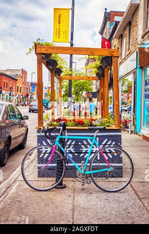 Montreal, Canada - June, 2018: Old city bicycle parked on mont royal street in Montreal, Canada. Stock Photo