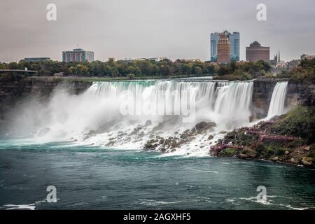 Niagara Falls - OCTOBER 06, 2018: The Maid of the Mist boat near waterfall at Niagara falls, Canada. Stock Photo