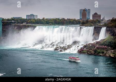 Niagara Falls - OCTOBER 06, 2018: The Maid of the Mist boat near waterfall at Niagara falls, Canada. Stock Photo