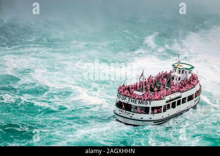 Niagara Falls - OCTOBER 06, 2018: The Maid of the Mist boat near waterfall at Niagara falls, Canada. Stock Photo