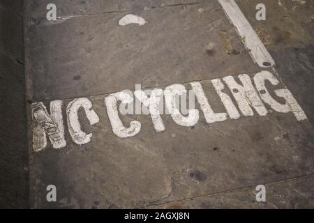 No cycling written on asphalt of pedestrian pathway tunnel. Stock Photo