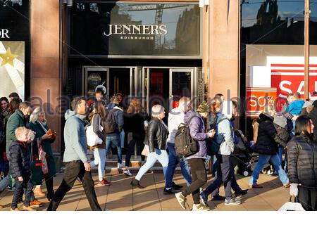Edinburgh, Scotland, UK. 22nd  Dec 2019. Christmas Shoppers at the entrance to Jenners department store, on a busy Princes Street stampede Sunday for last minute Christmas shopping. 50% off sale already in progress. Credit: Craig Brown/Alamy Live News Stock Photo