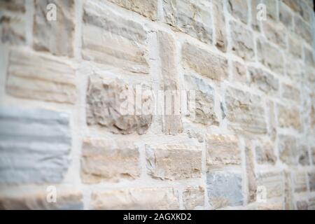 facade made of white limestone bricks Stock Photo