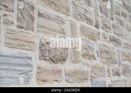 facade made of white limestone bricks Stock Photo